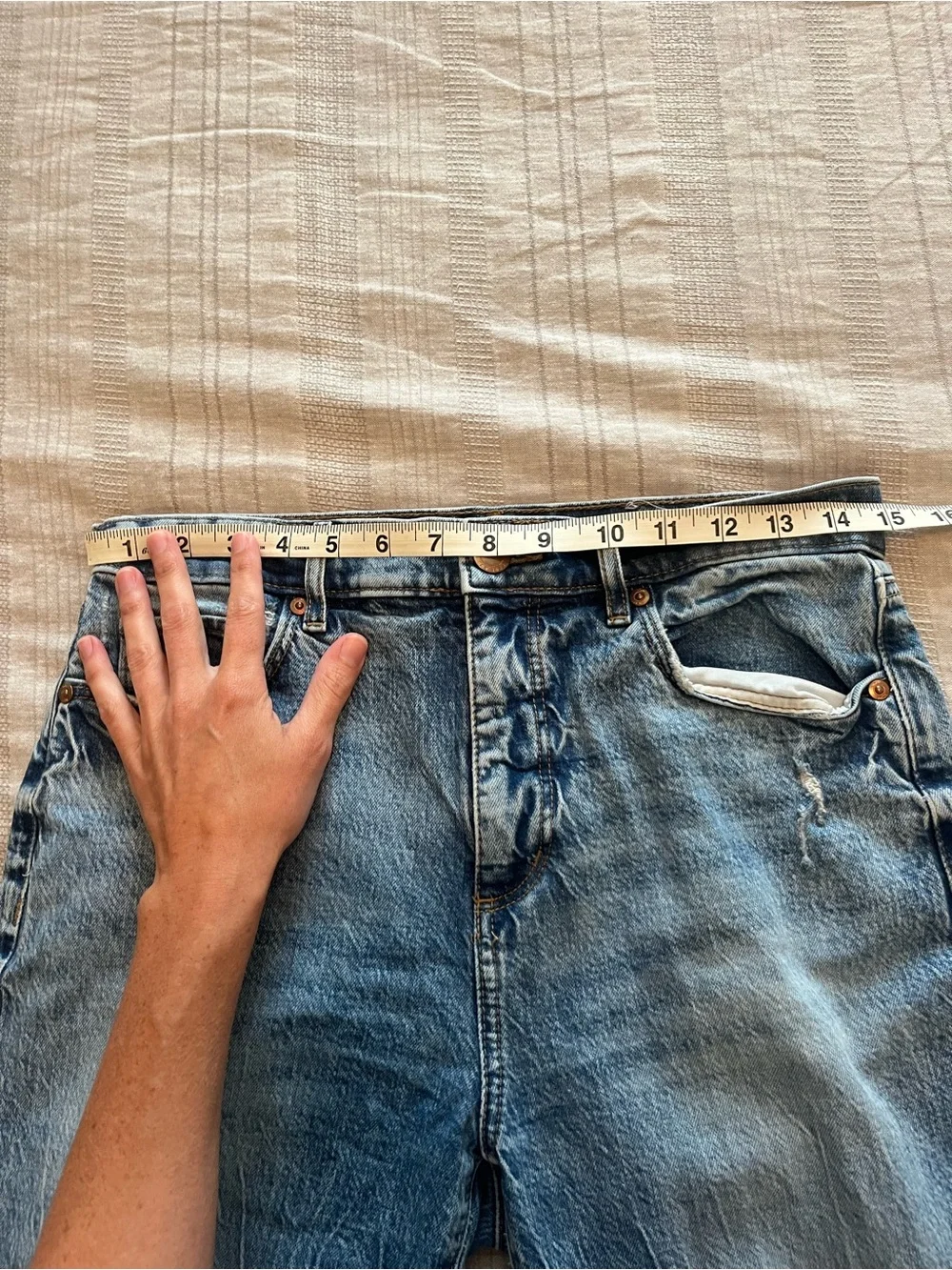 LOFT distressed light-medium wash jeans
